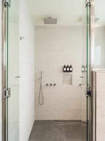 a shower with glass doors