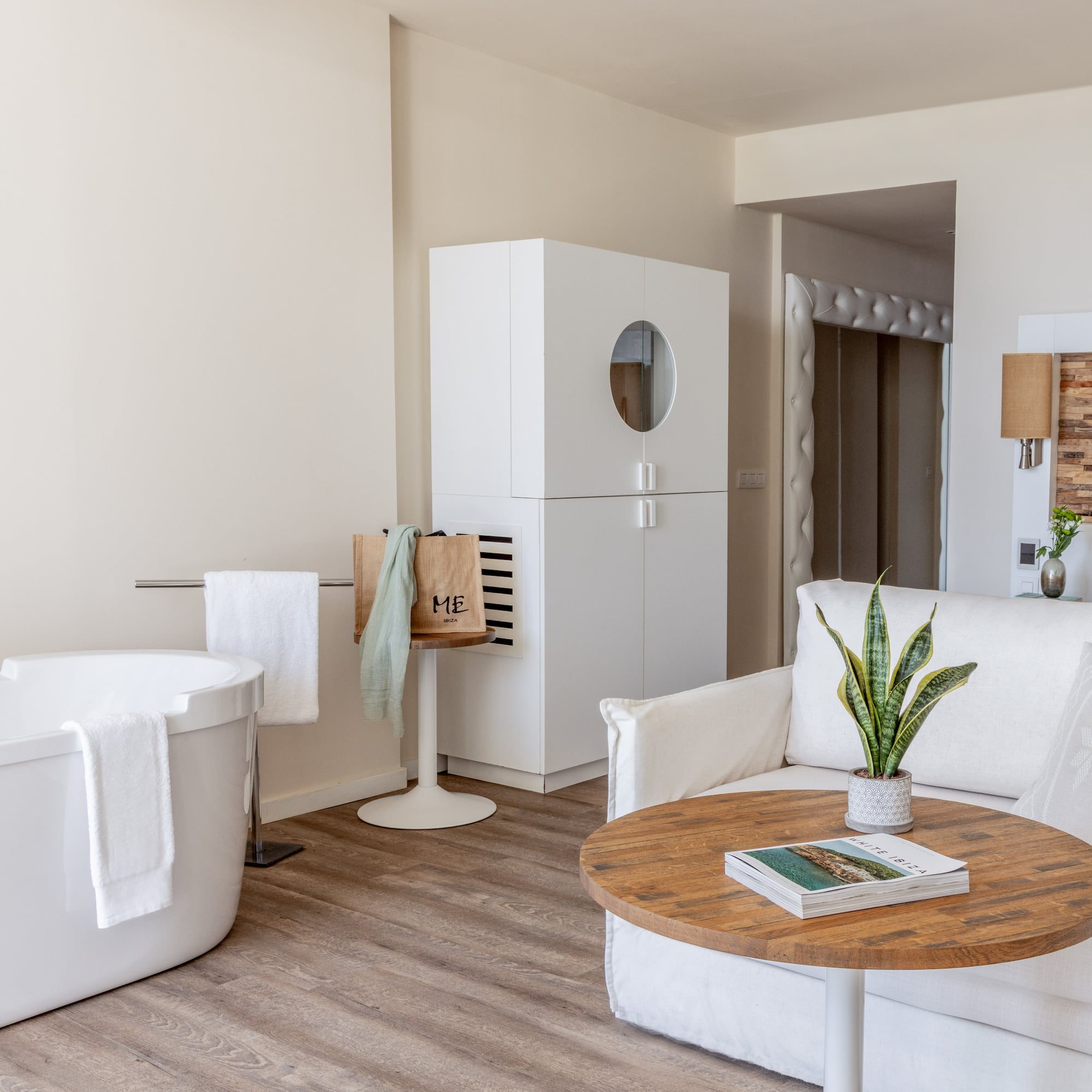 a room with a tub and a couch