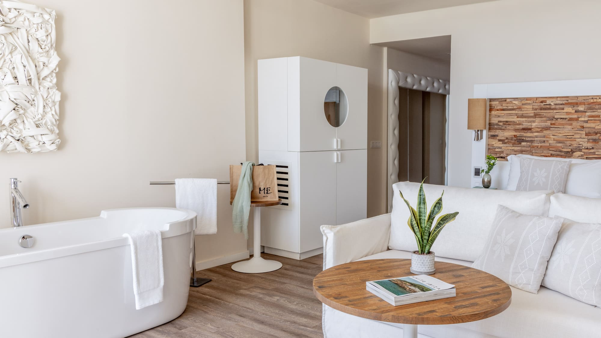 a room with a tub and a couch