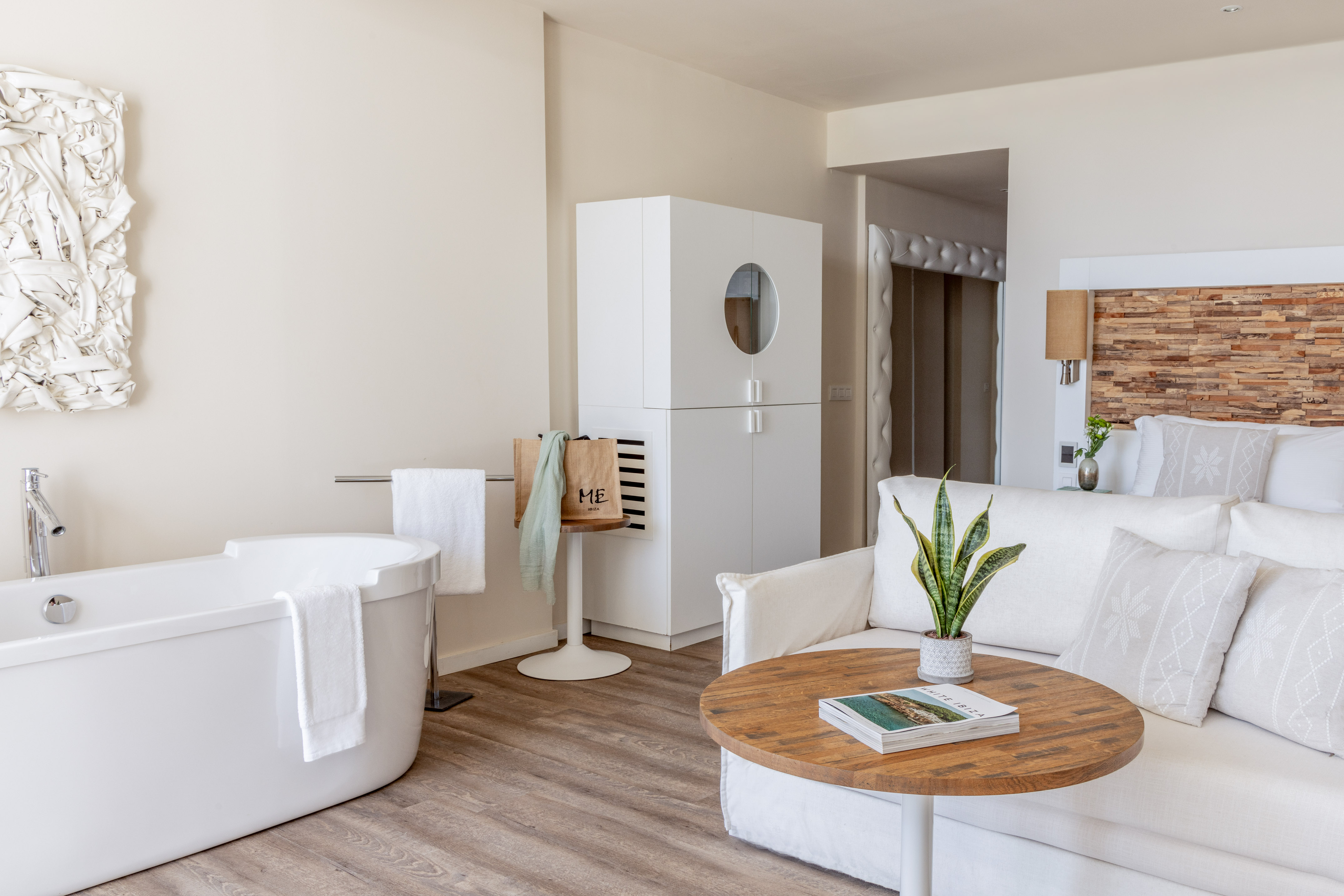 a room with a tub and a couch