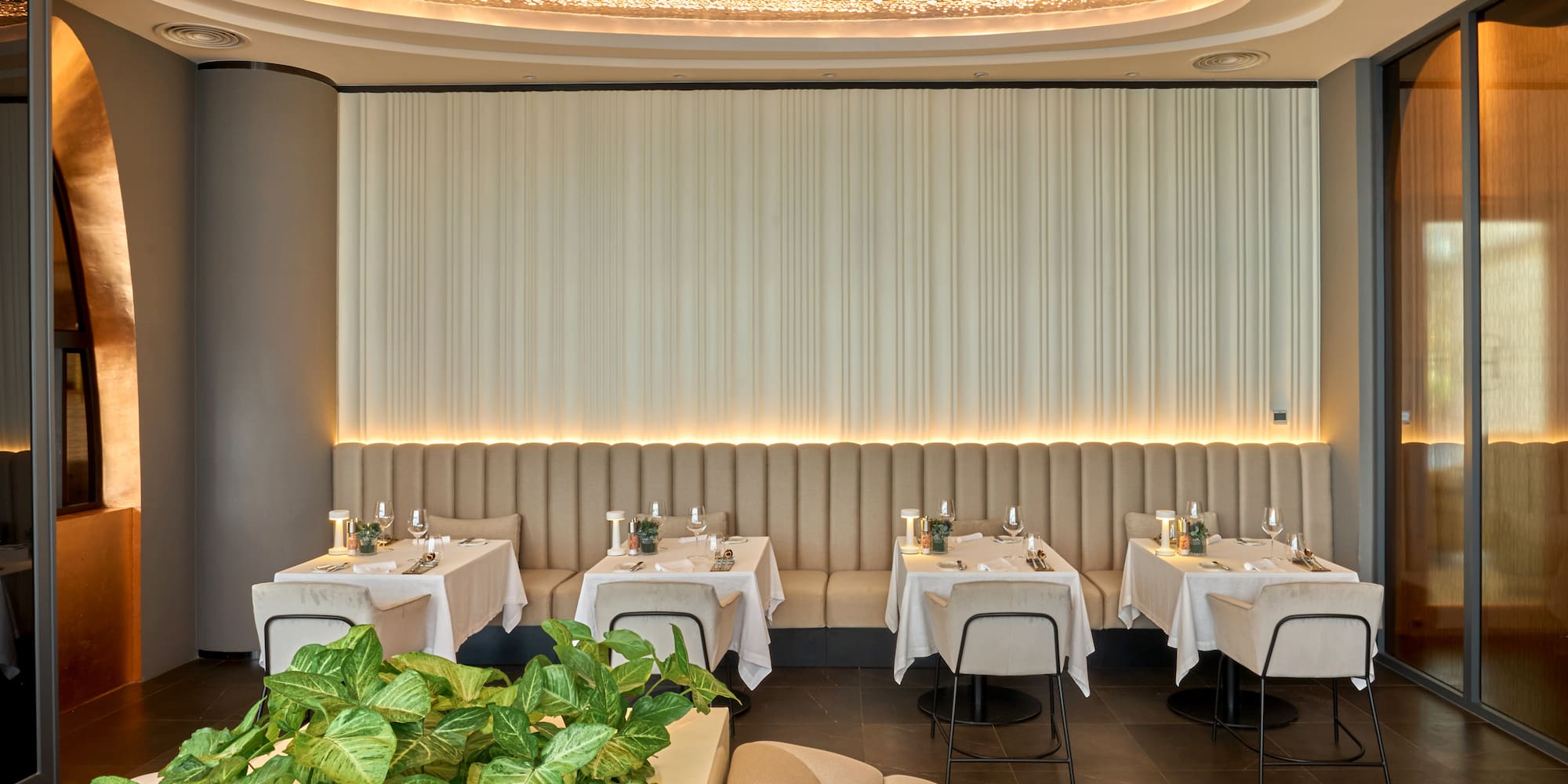 a restaurant with tables and chairs