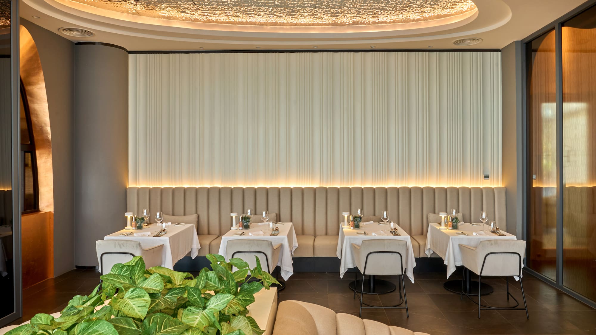 a restaurant with tables and chairs