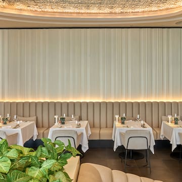 a restaurant with tables and chairs