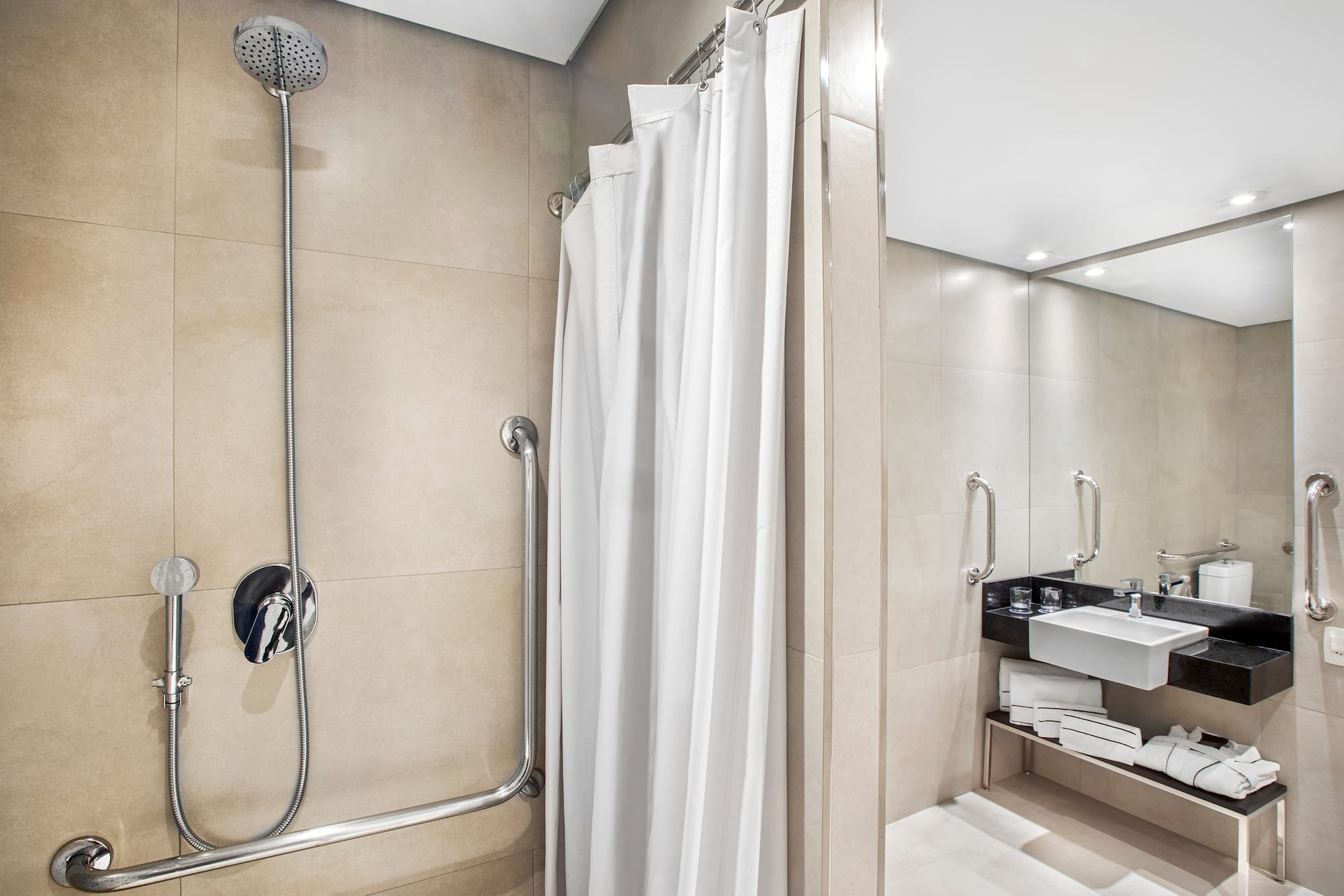 a shower with a white curtain