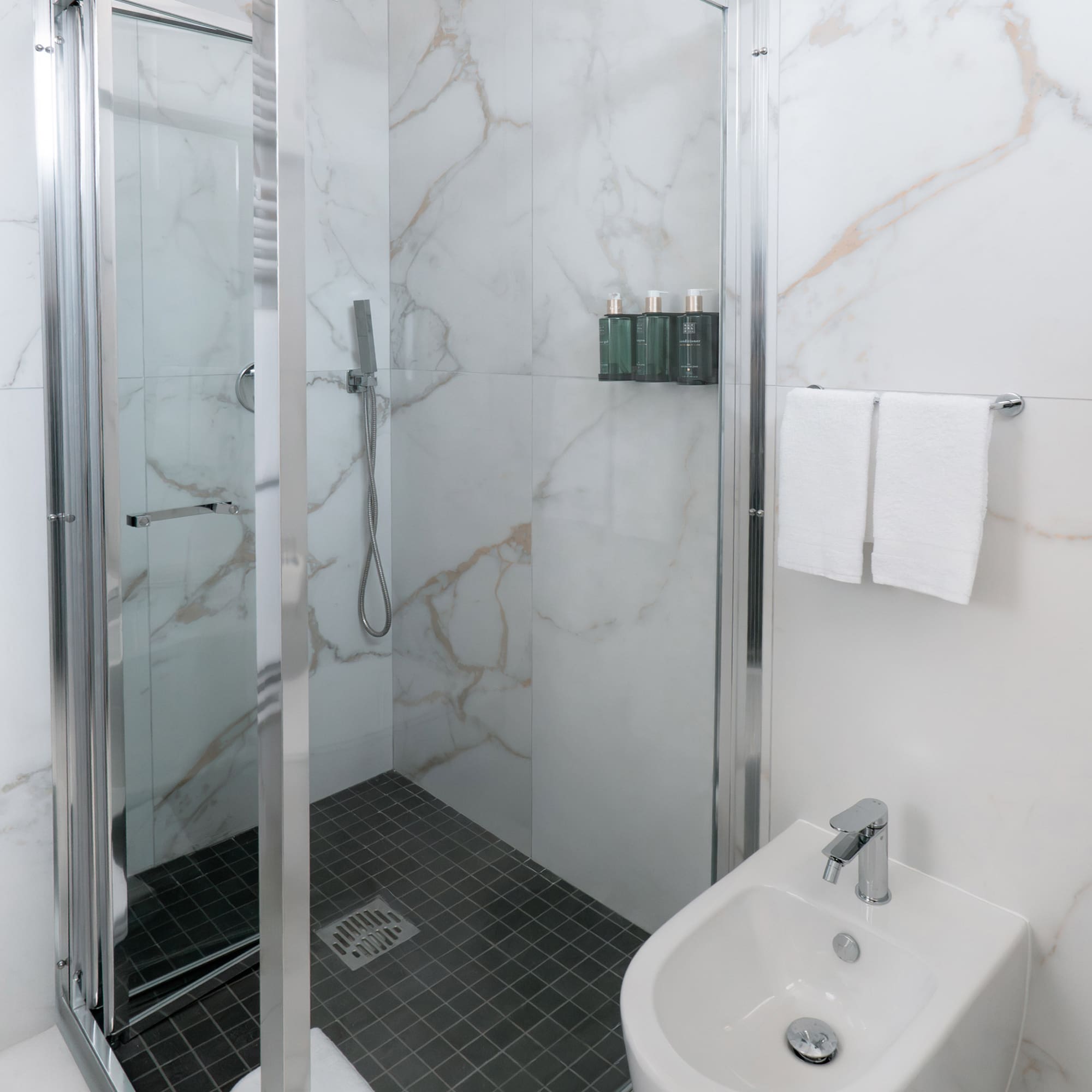 a shower and sink in a bathroom