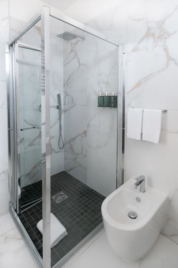 a shower and sink in a bathroom