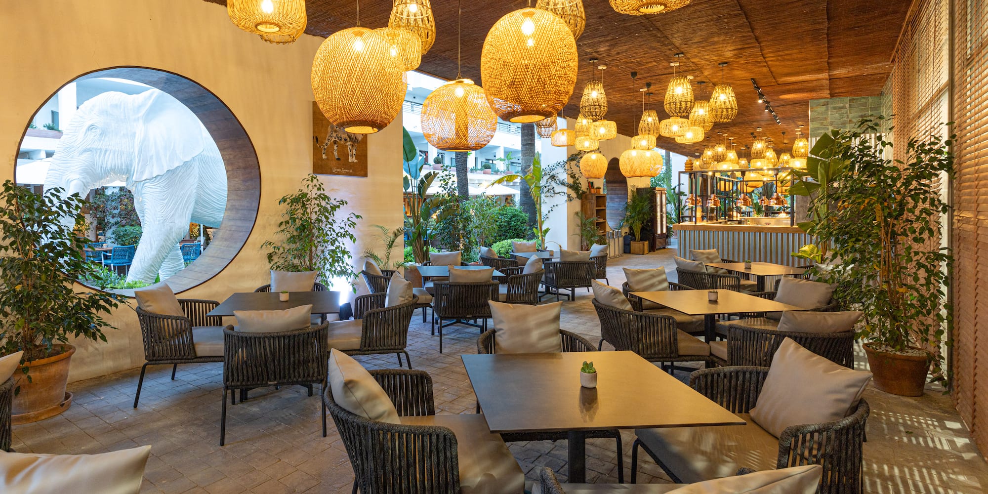 a restaurant with tables and chairs