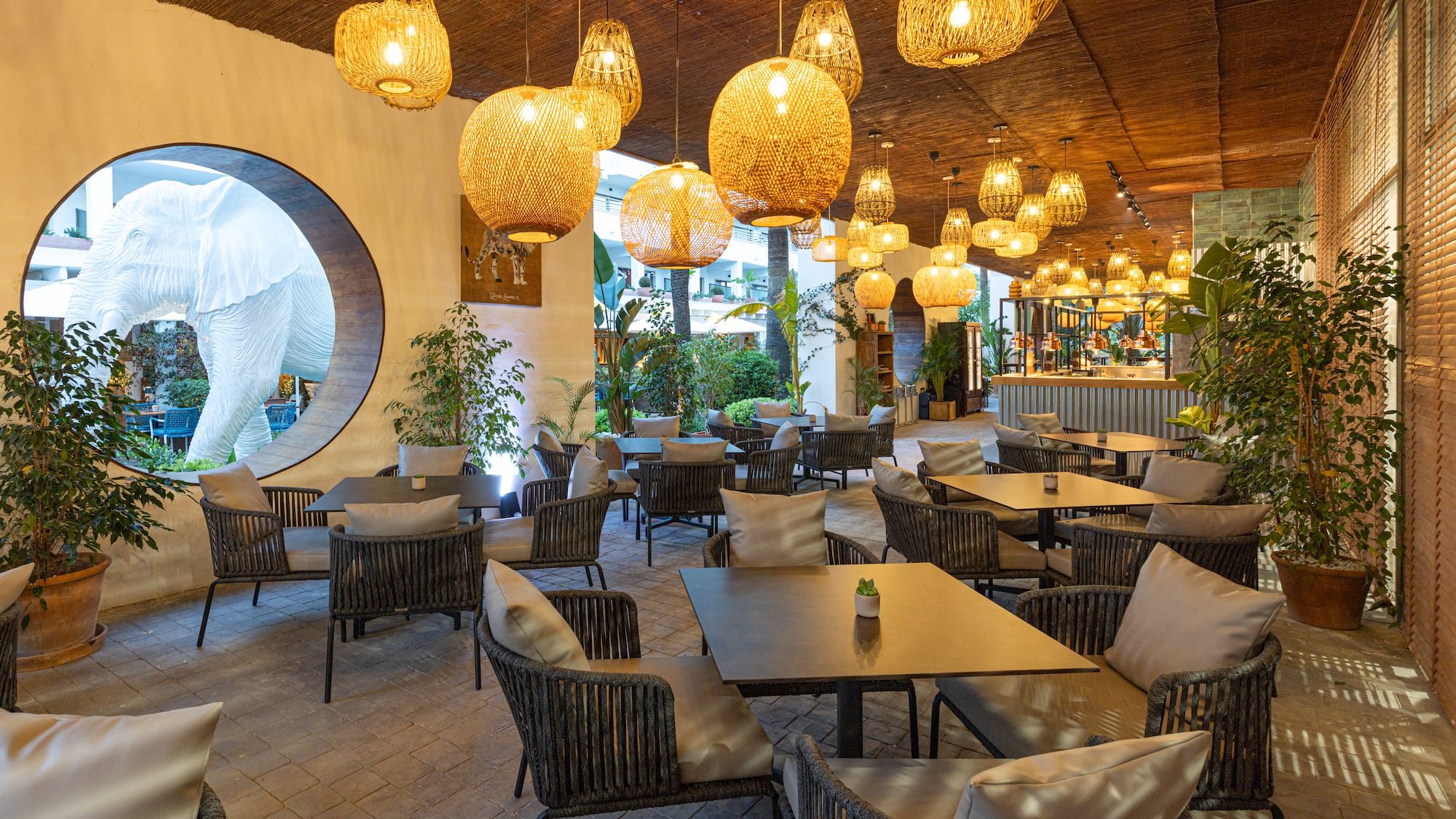 a restaurant with tables and chairs