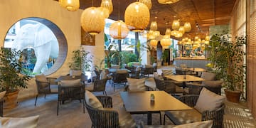 a restaurant with tables and chairs