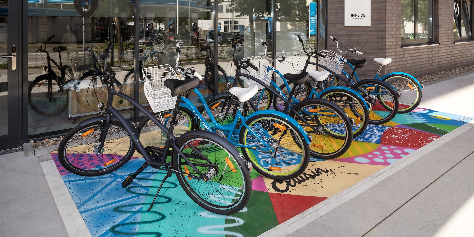 a group of bicycles parked outside a building