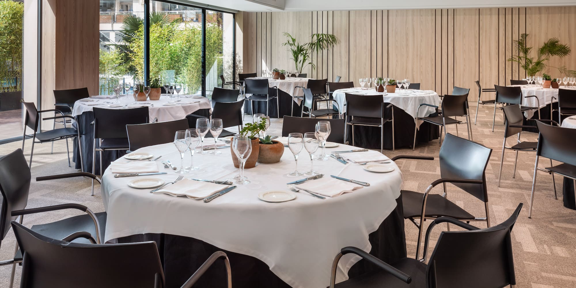 a room with tables and chairs