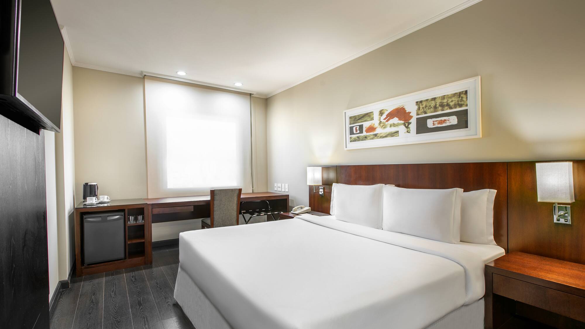 a room with a bed and a desk