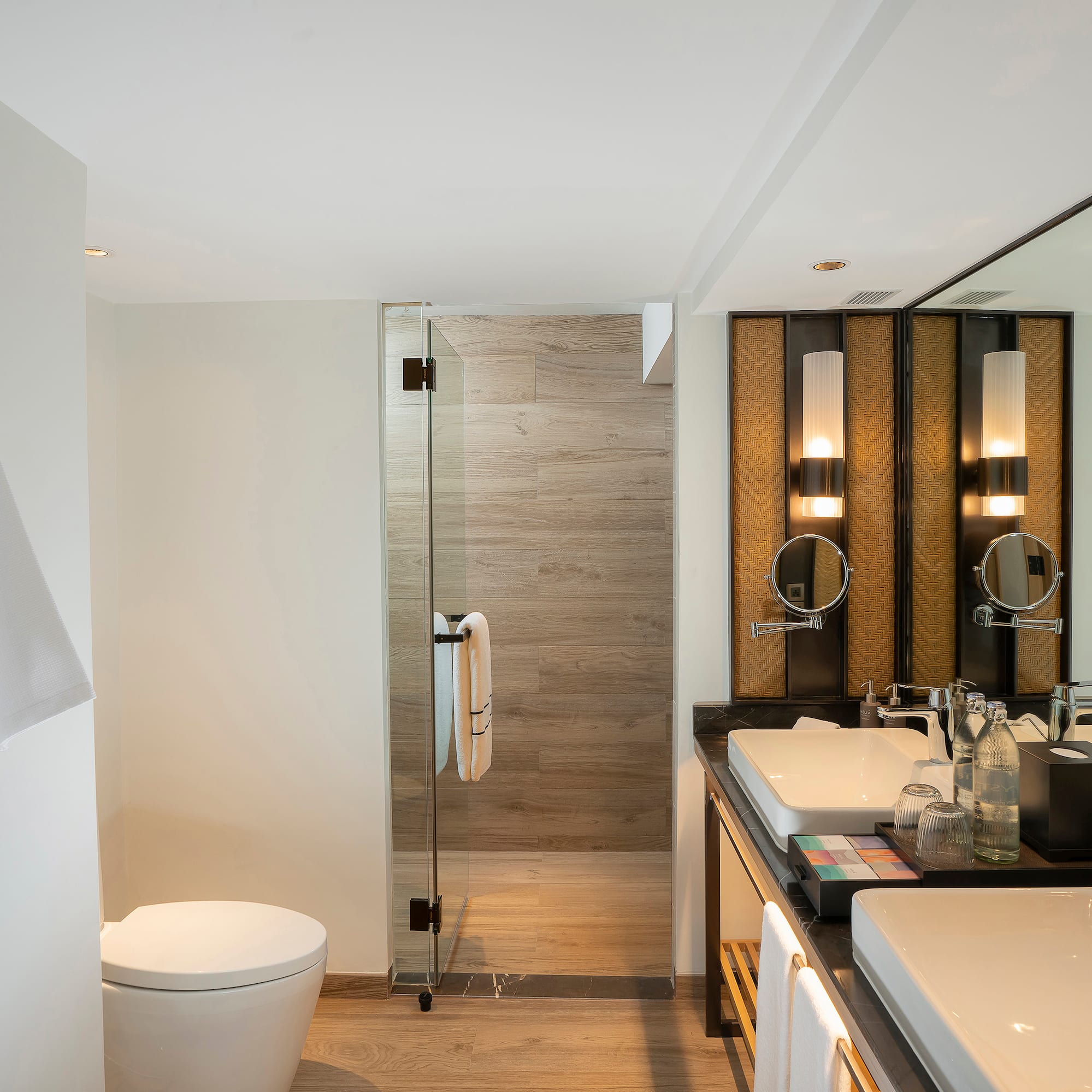 a bathroom with a shower and sink