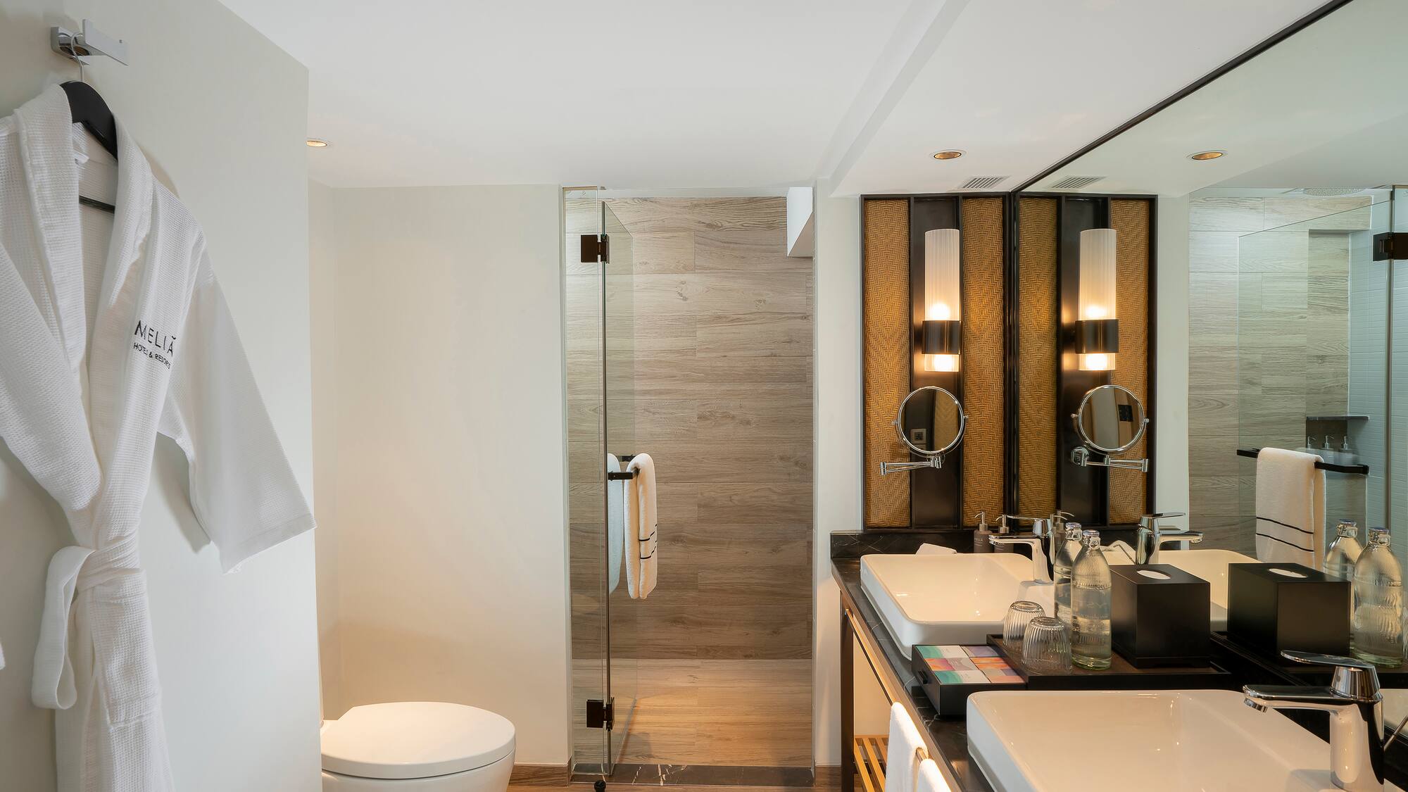 a bathroom with a shower and sink