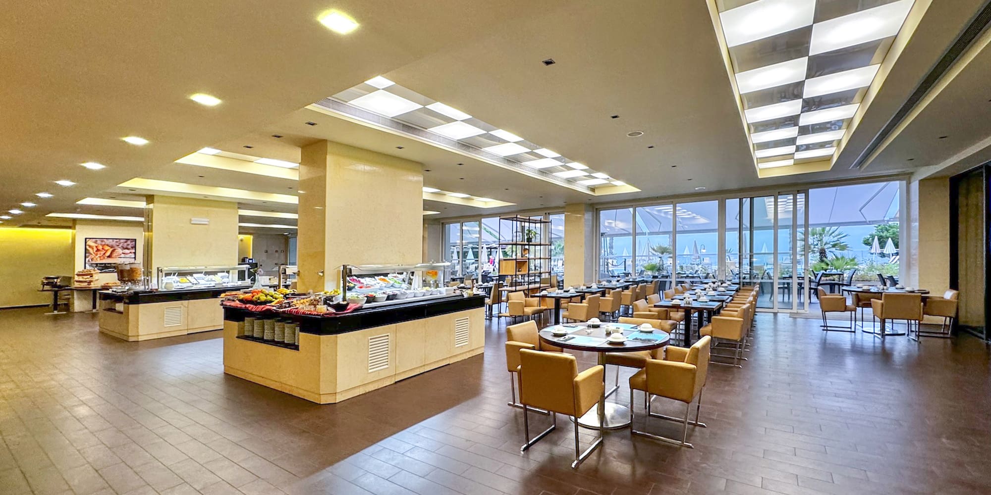 a restaurant with a buffet and tables