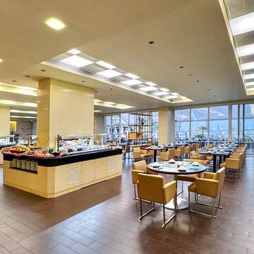 a restaurant with a buffet and tables