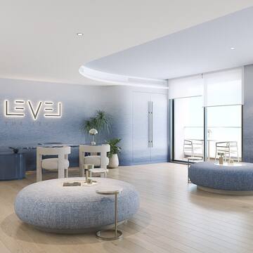 a room with round tables and chairs