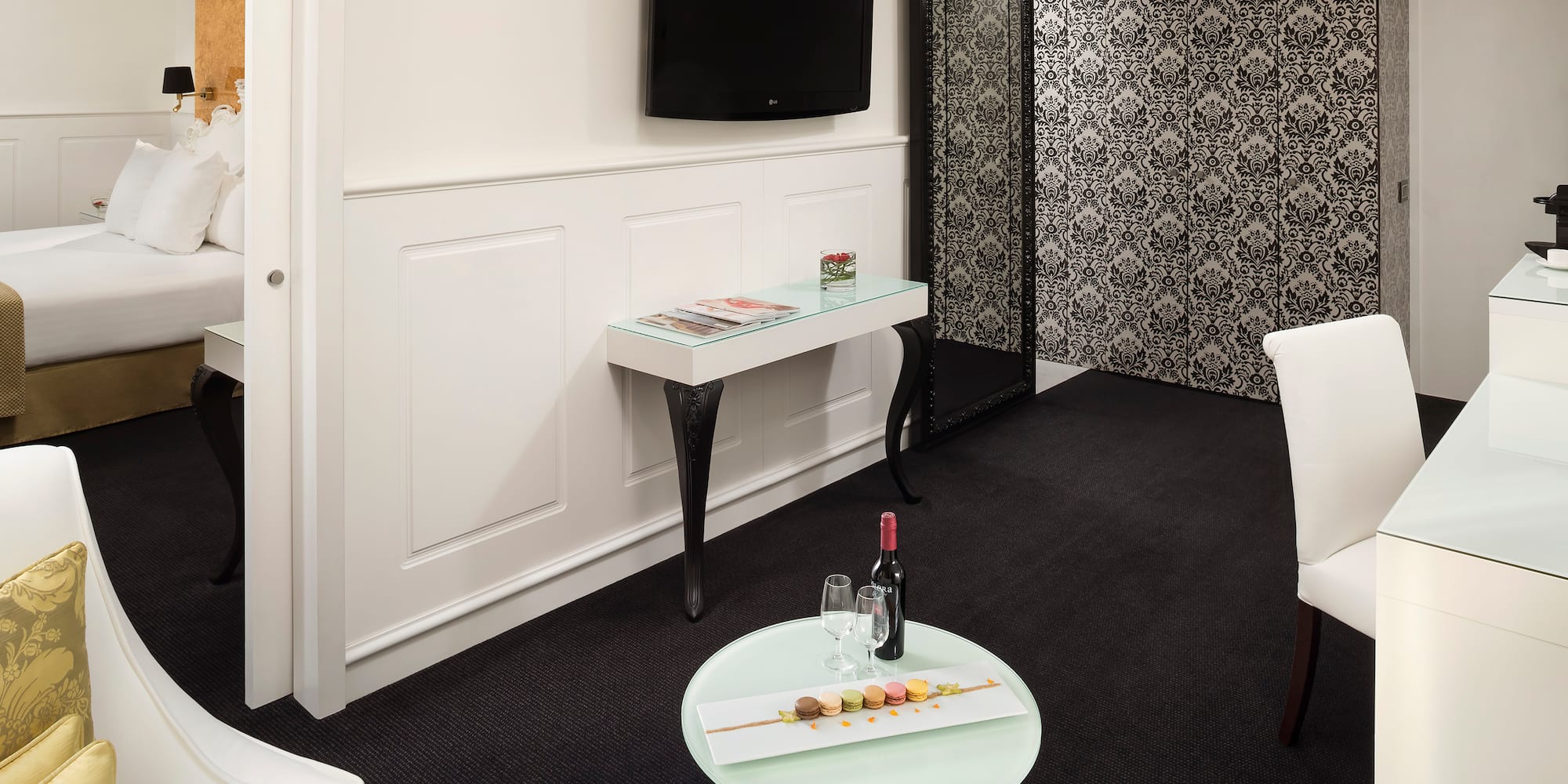 a room with a table and a tv