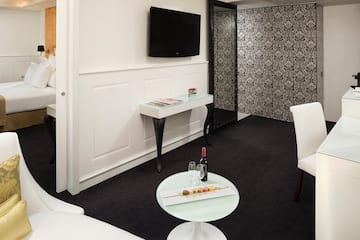 a room with a table and a tv