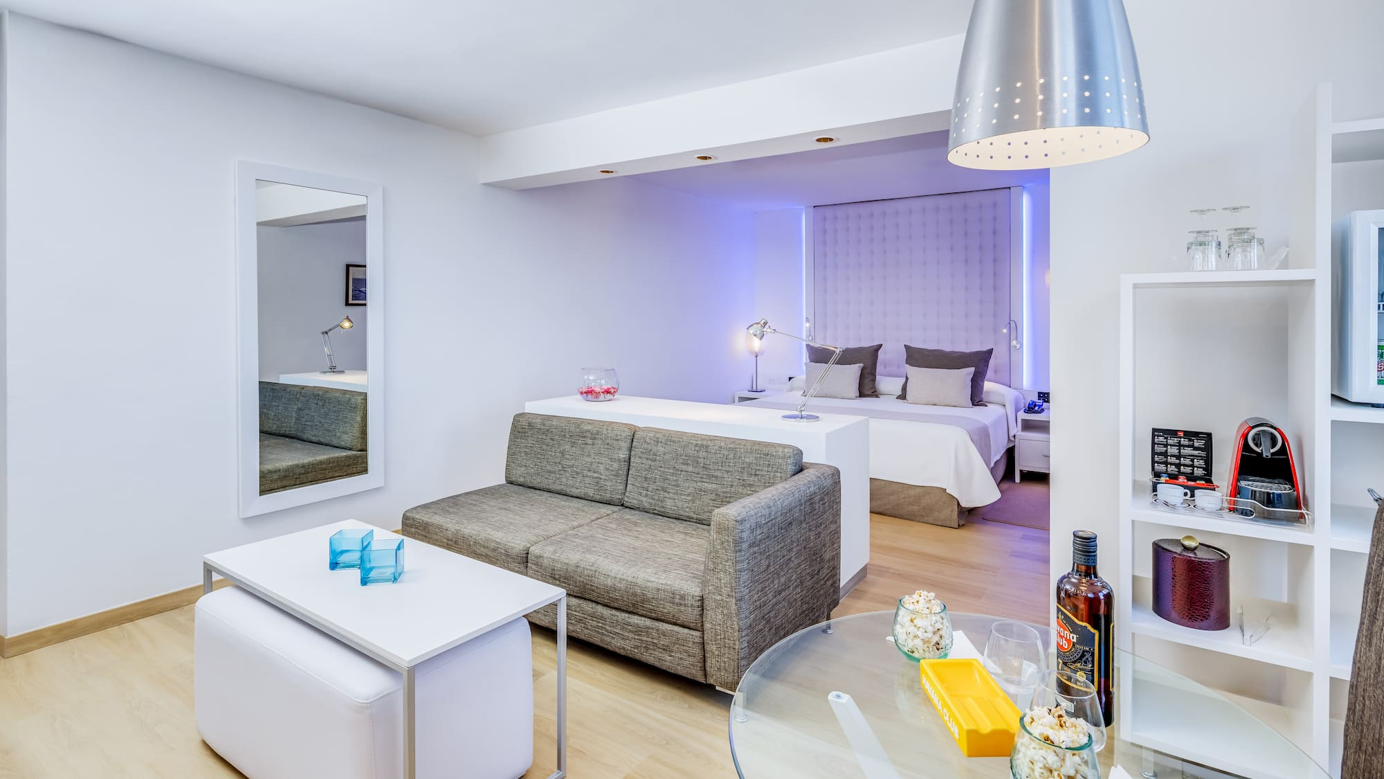 a room with a couch and a bed