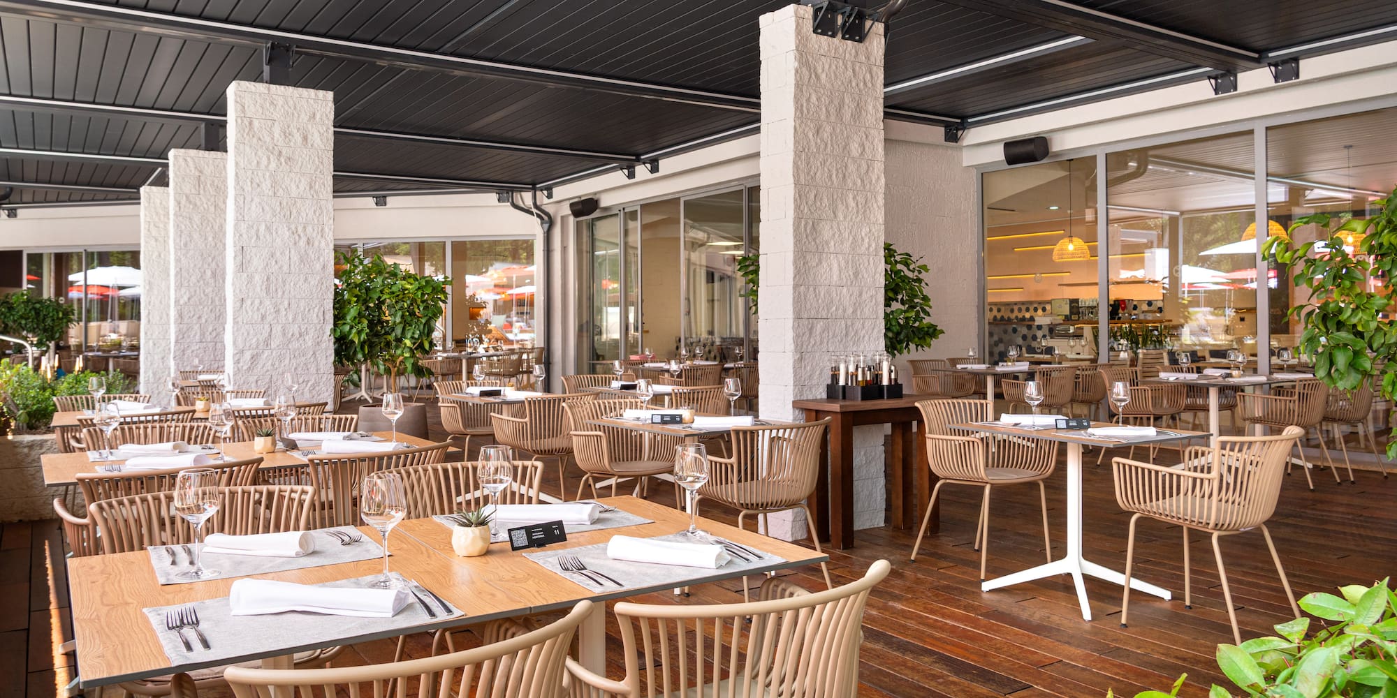 a restaurant with tables and chairs