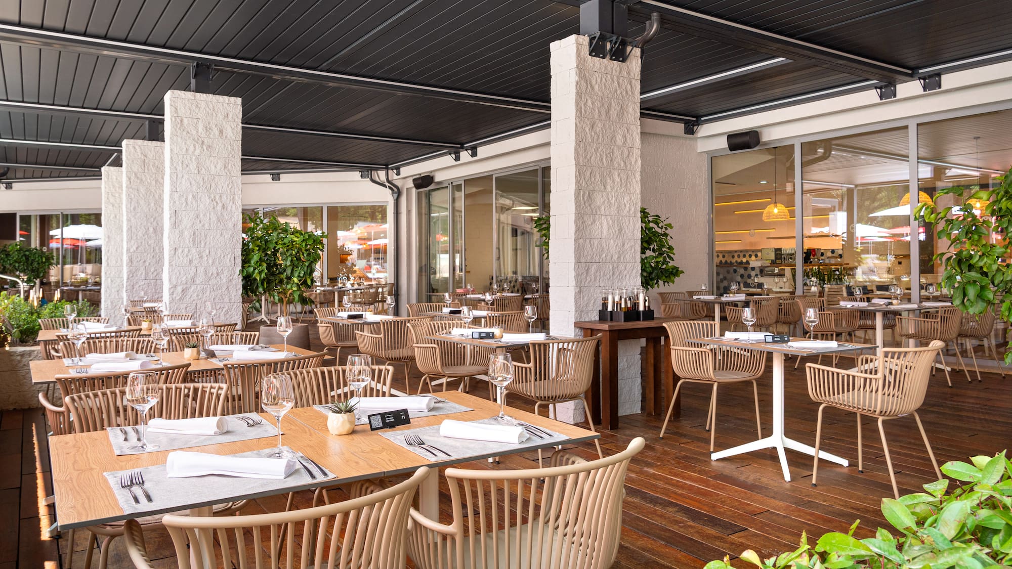 a restaurant with tables and chairs