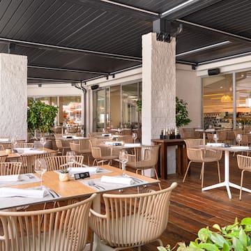 a restaurant with tables and chairs