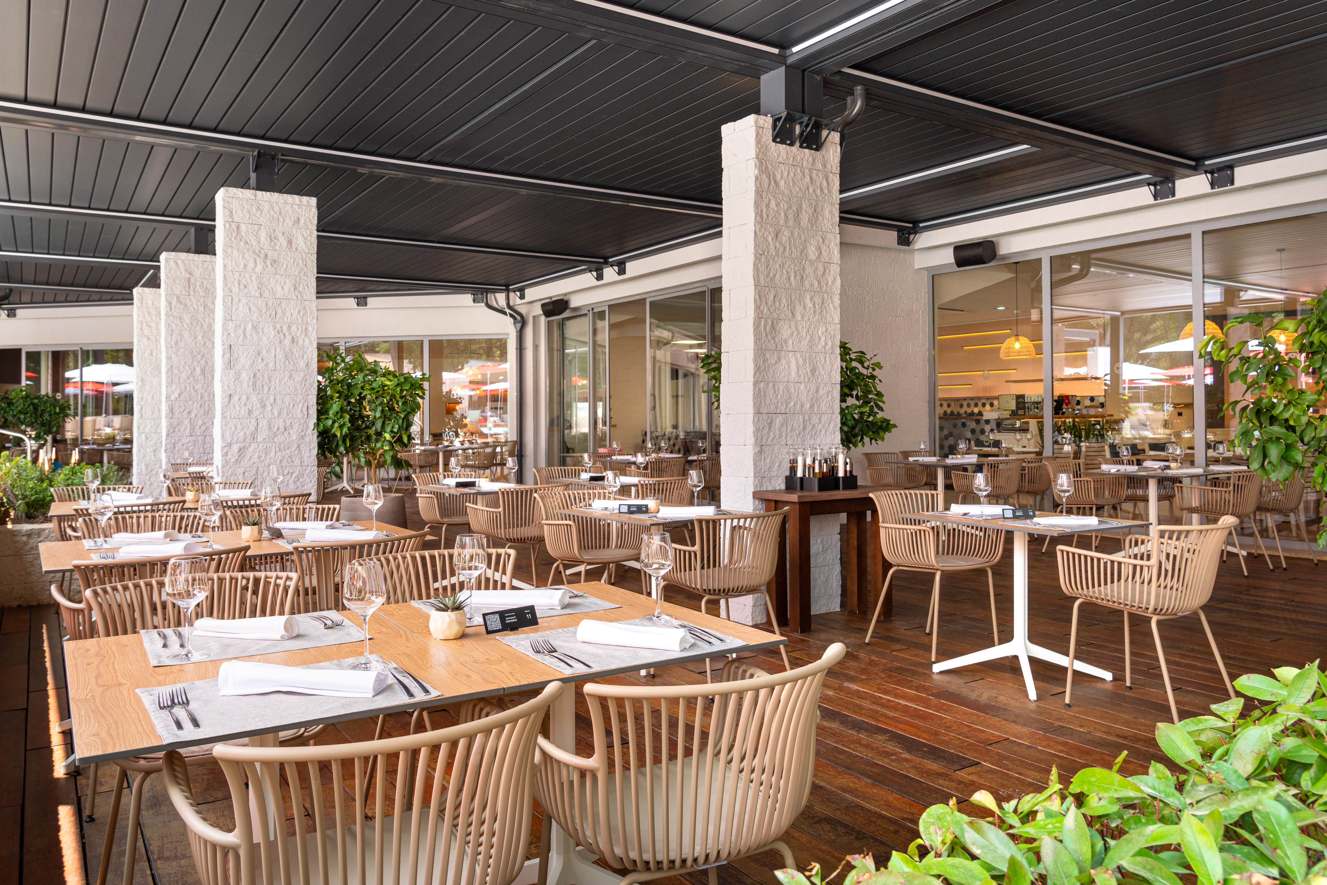 a restaurant with tables and chairs