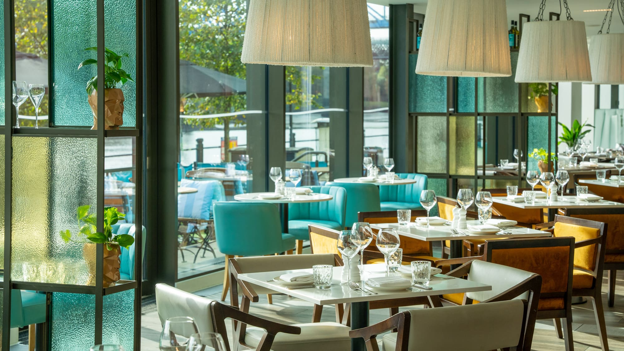 a restaurant with tables and chairs