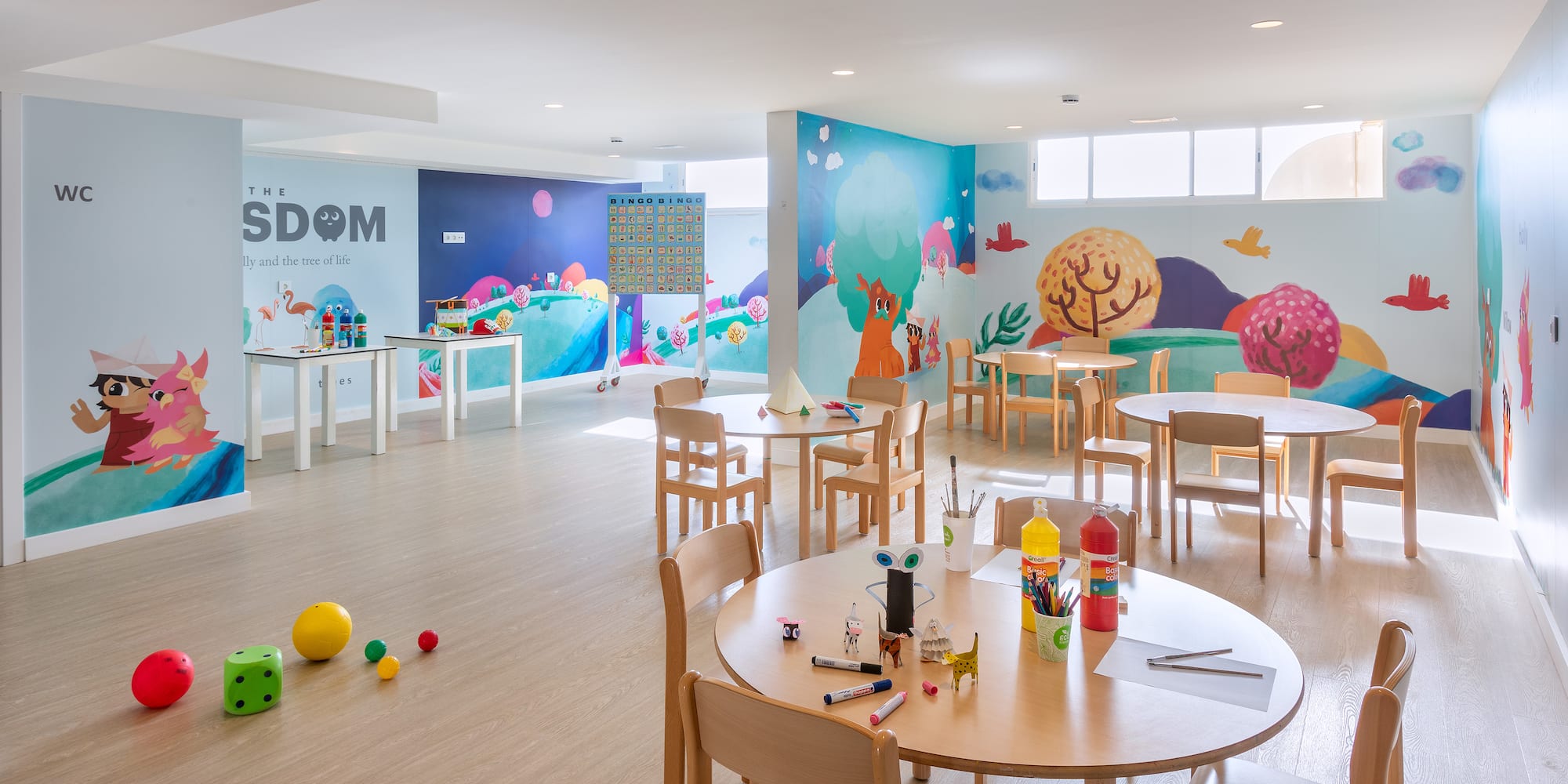 a room with tables and chairs