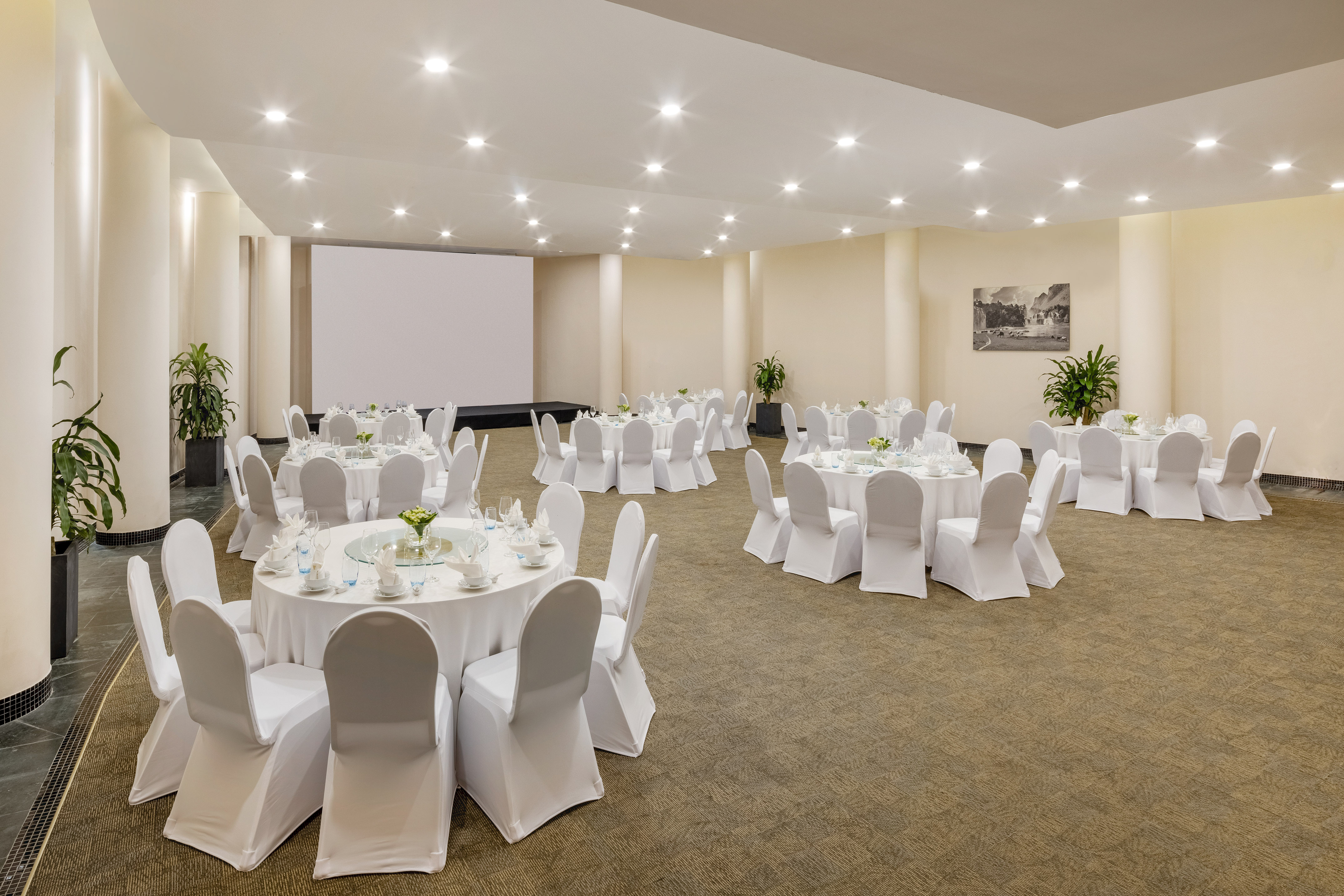 a room with tables and chairs