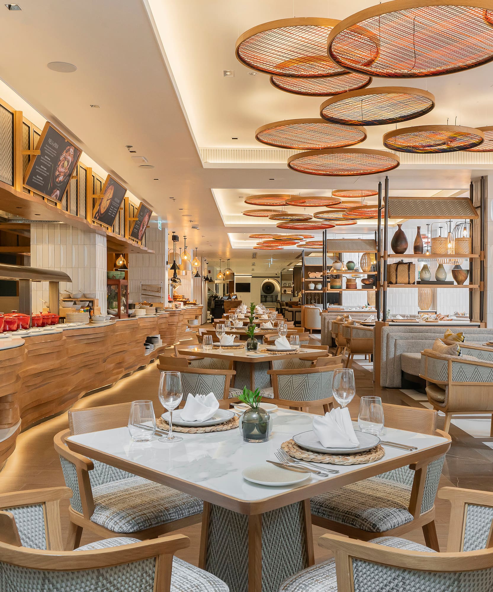 a restaurant with tables and chairs