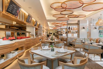 a restaurant with tables and chairs