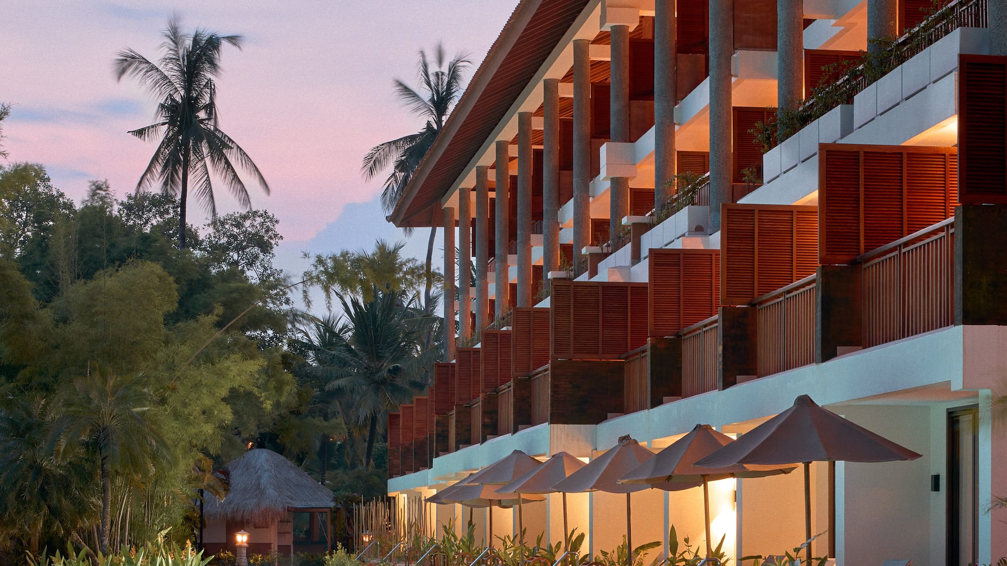 a pool with a building and trees