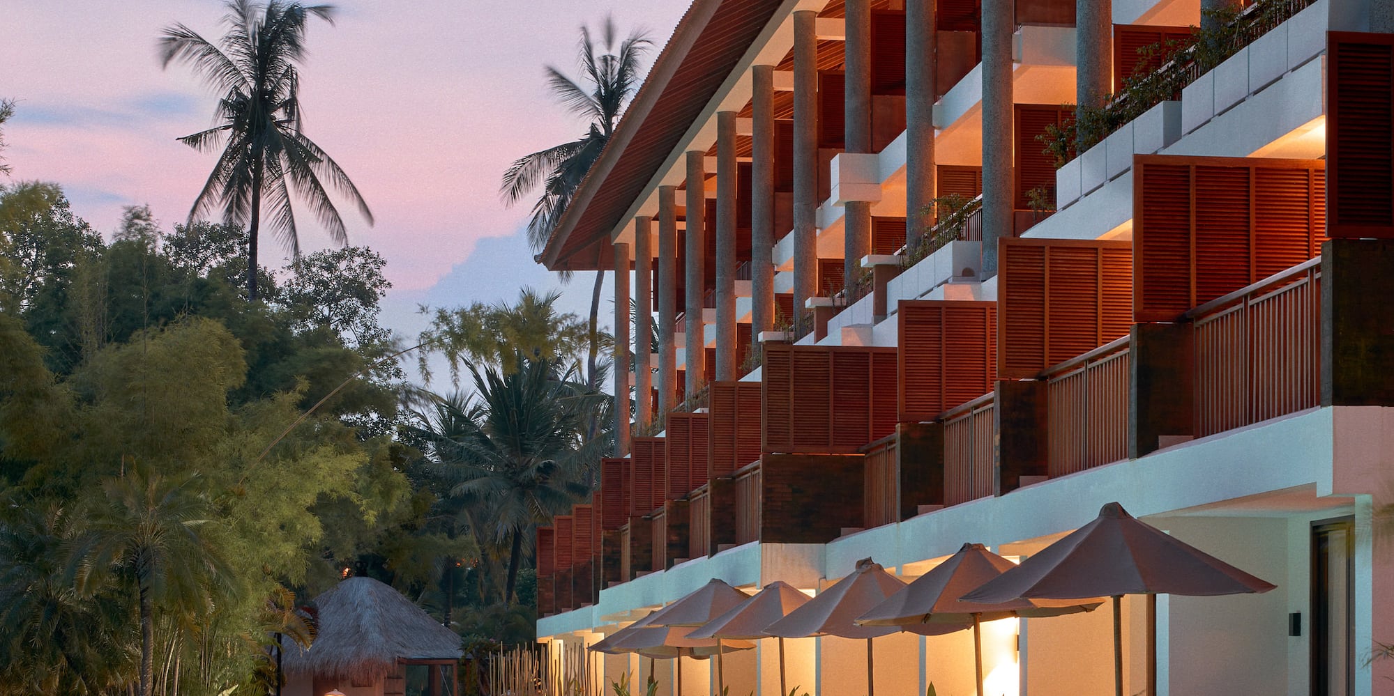 a pool with a building and trees