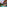 a pool with a building and trees