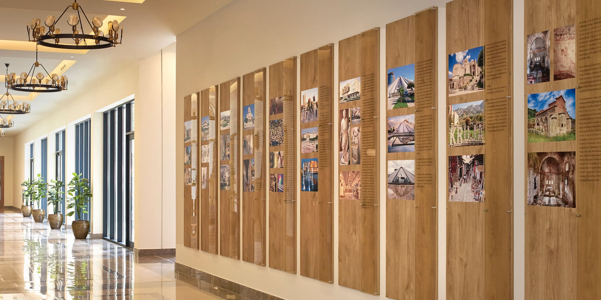 a long wall with pictures on it