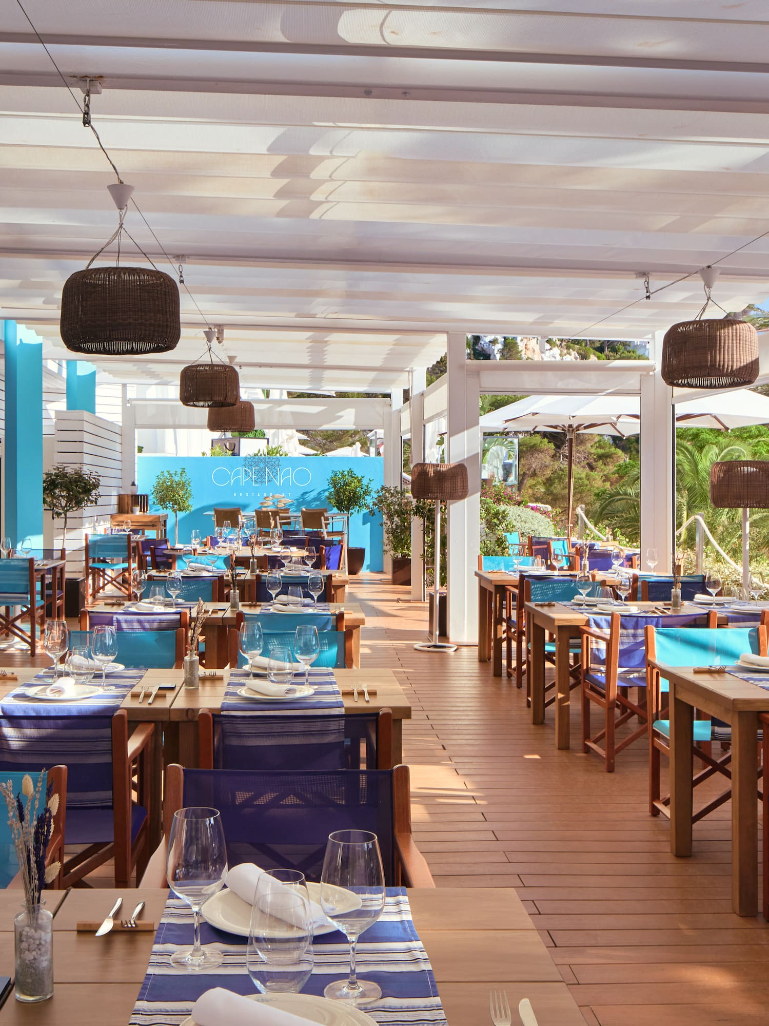 a restaurant with tables and chairs