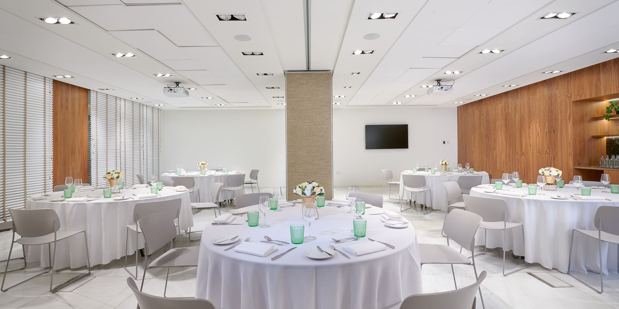 a room with tables and chairs