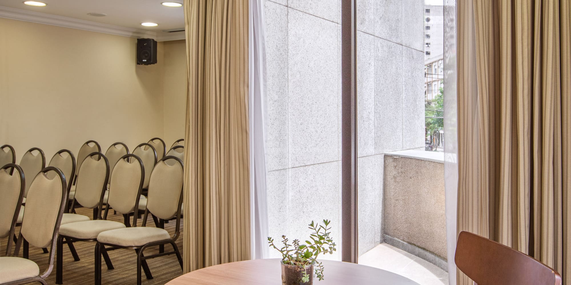 a room with a table and chairs