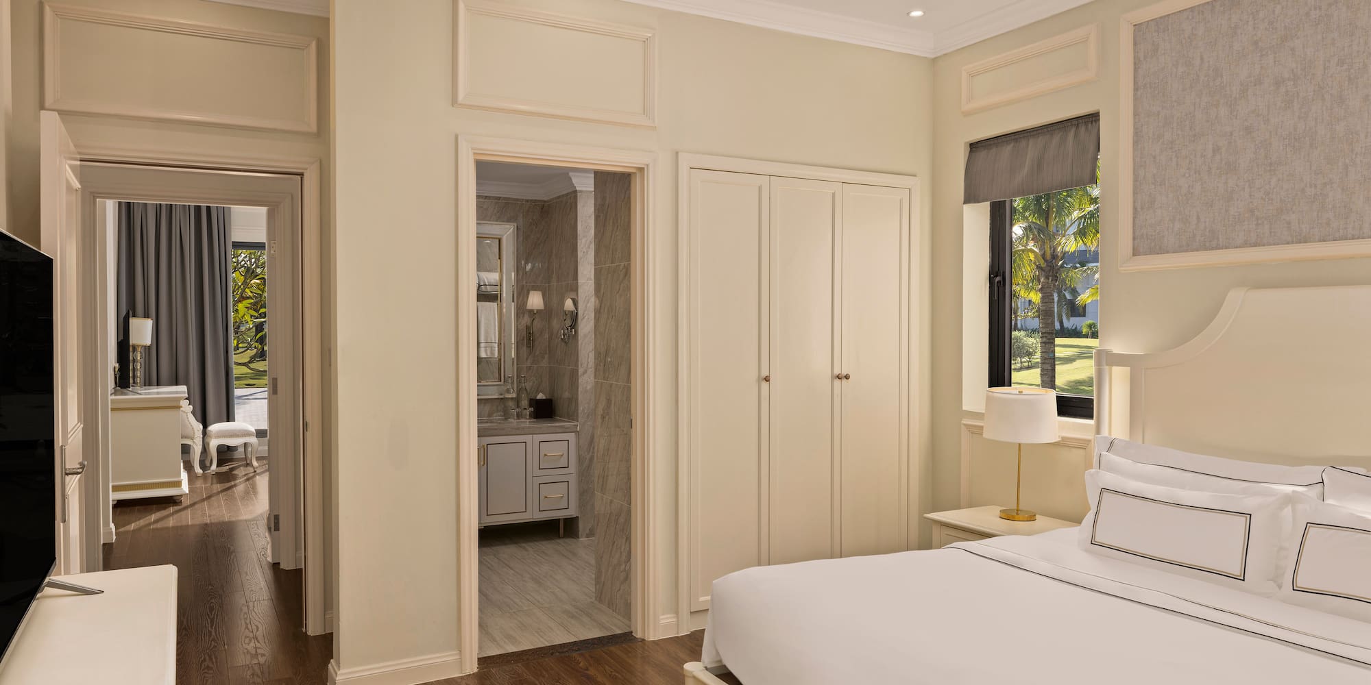 a bedroom with a bed and a mirror