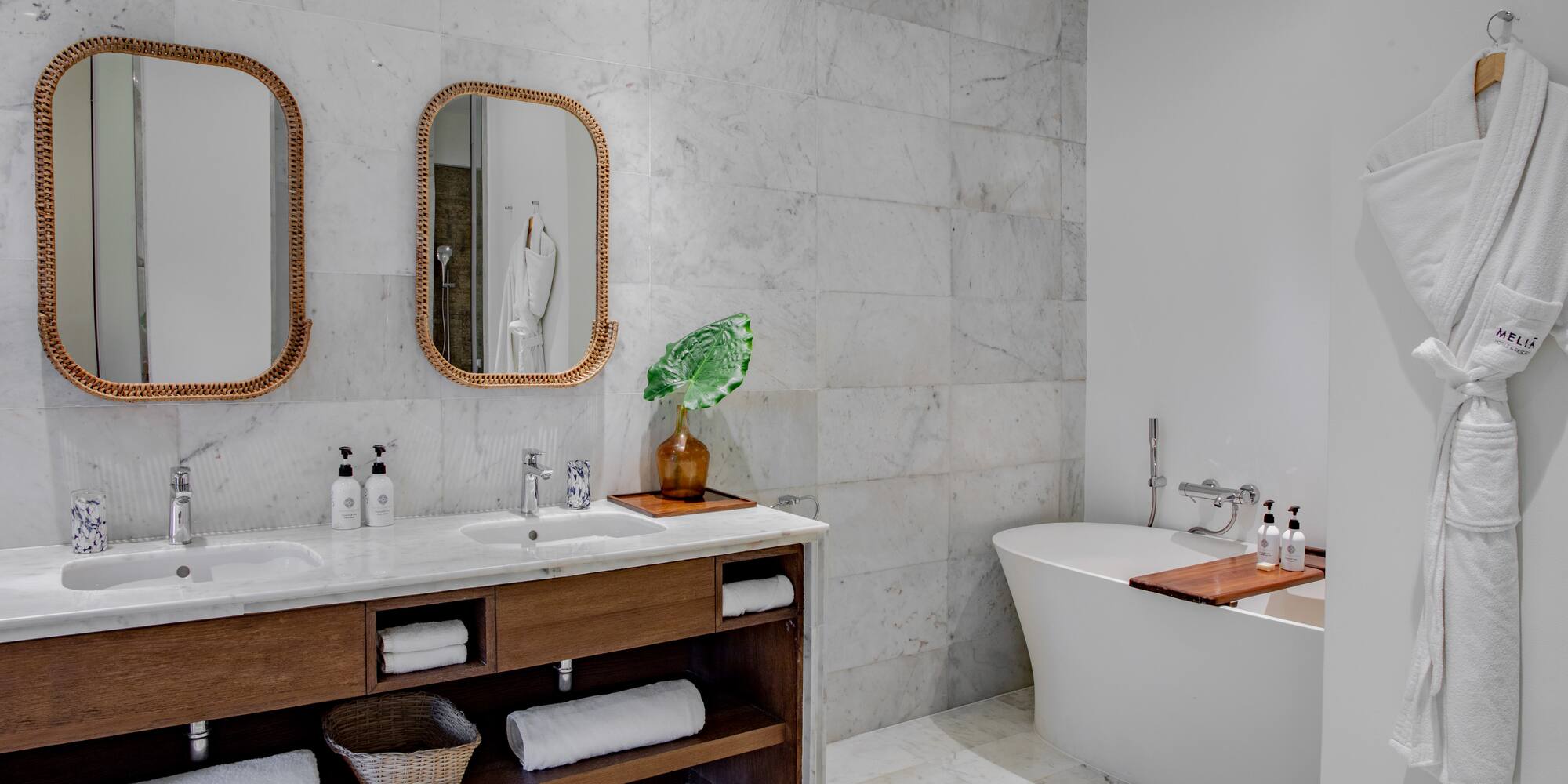 bathroom which includes bathtub and rain shower at Melia Zanzibar