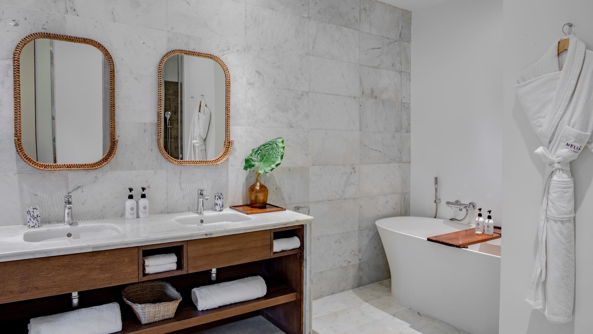 bathroom which includes bathtub and rain shower at Melia Zanzibar