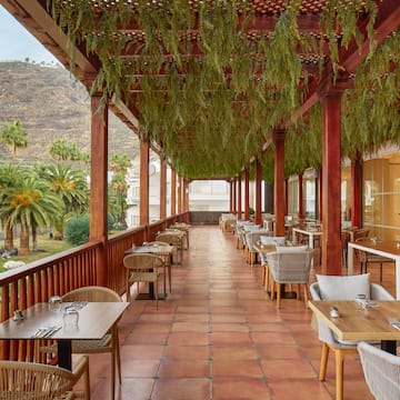 a restaurant with tables and chairs