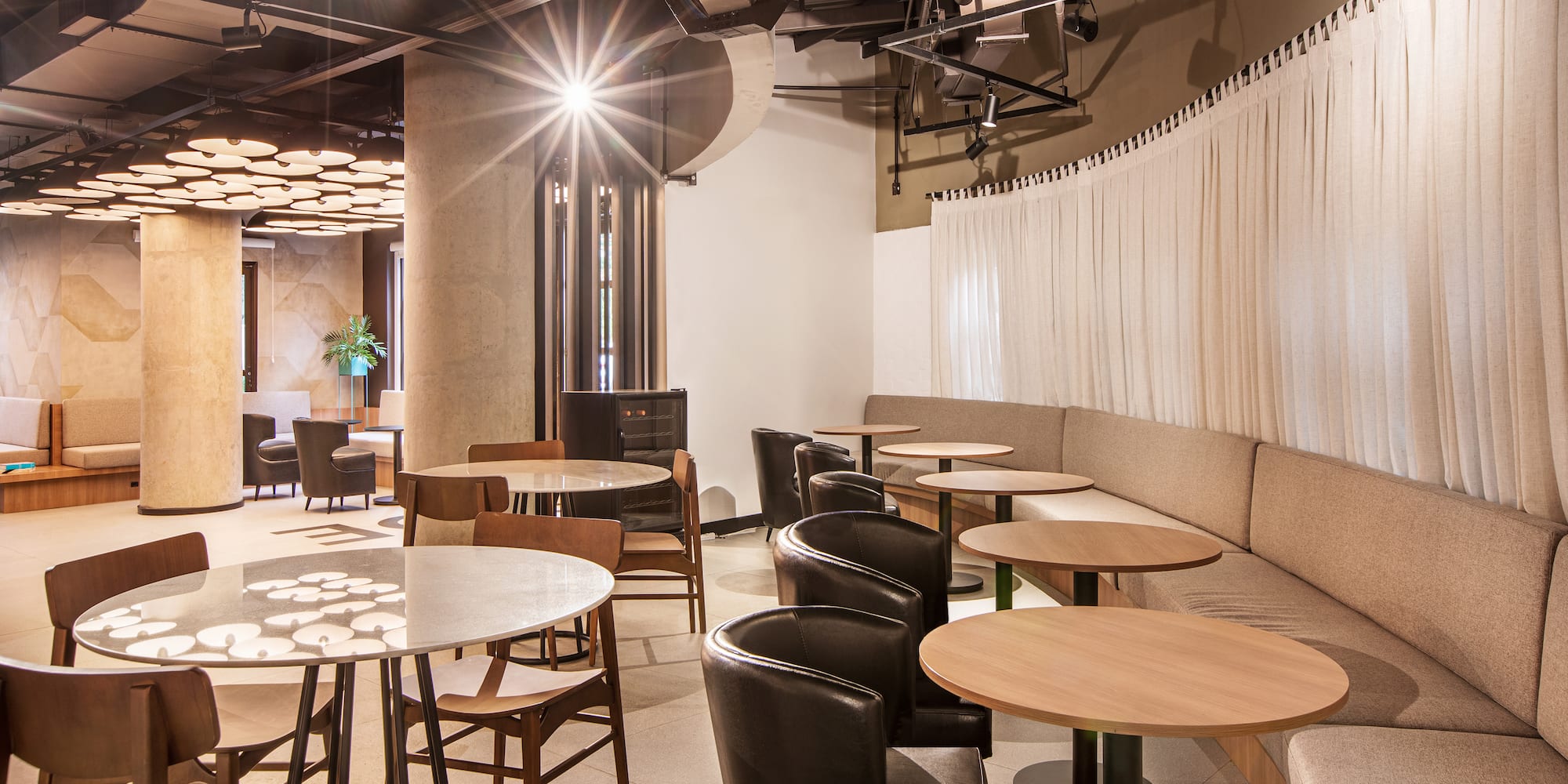 a room with tables and chairs