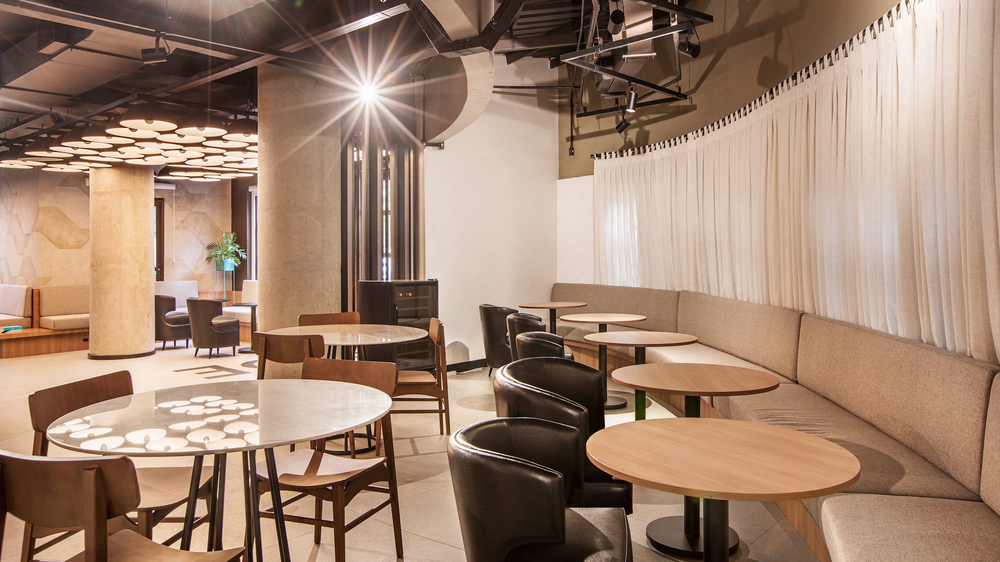 a room with tables and chairs