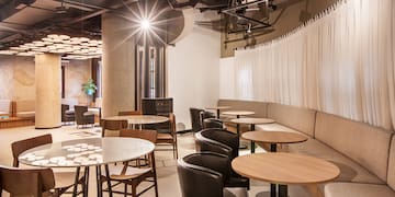 a room with tables and chairs