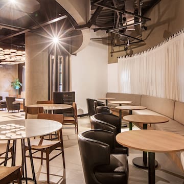 a room with tables and chairs