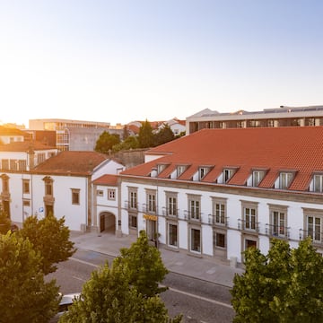 a group of buildings with trees