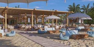 a beach with a large patio area